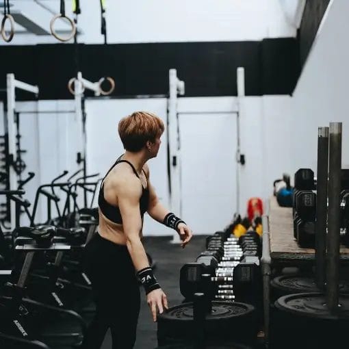 Woman surrounded with equipment