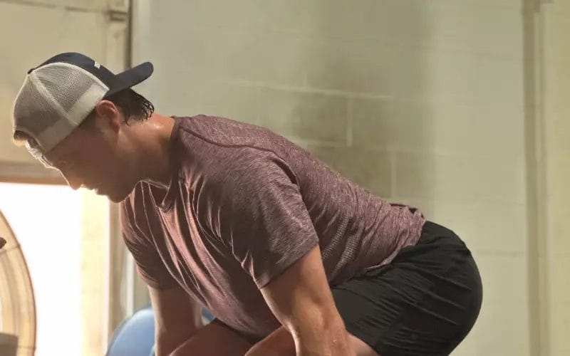 Man lift weights at Shea Training Systems